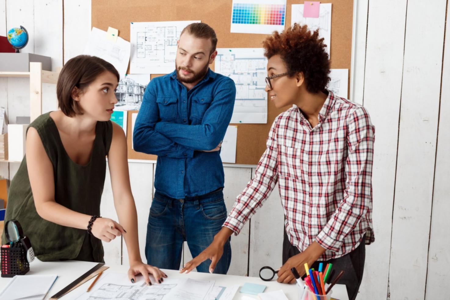 Financial analysis session with instructor and students reviewing investment documents